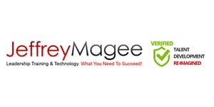 A logo of key magee and veritas